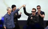 Why Your iTunes Had a Free U2 Album “Songs of Innocence”