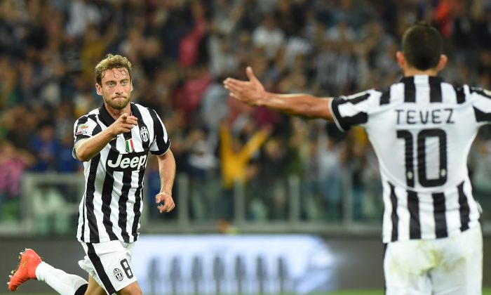 Claudio Marchisio (R) of Juventus FC celebrates a goal during the Serie A match between Juventus FC and Udinese Calcio at Juventus Arena on September 13, 2014 in Turin, Italy. (Photo by Valerio Pennicino/Getty Images)
