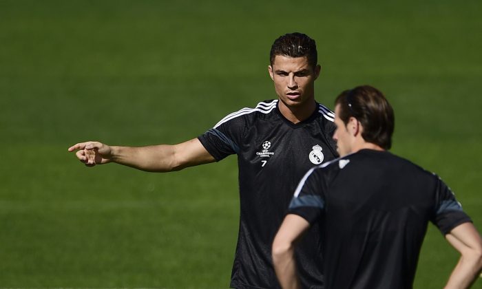 Real Madrid's Portuguese forward Cristiano Ronaldo takes part in a training session at Valdebebas in Madrid on September 15, 2014 on the eve of the UEFA Champions League football match Real Madrid vs Basel. (PIERRE-PHILIPPE MARCOU/AFP/Getty Images)