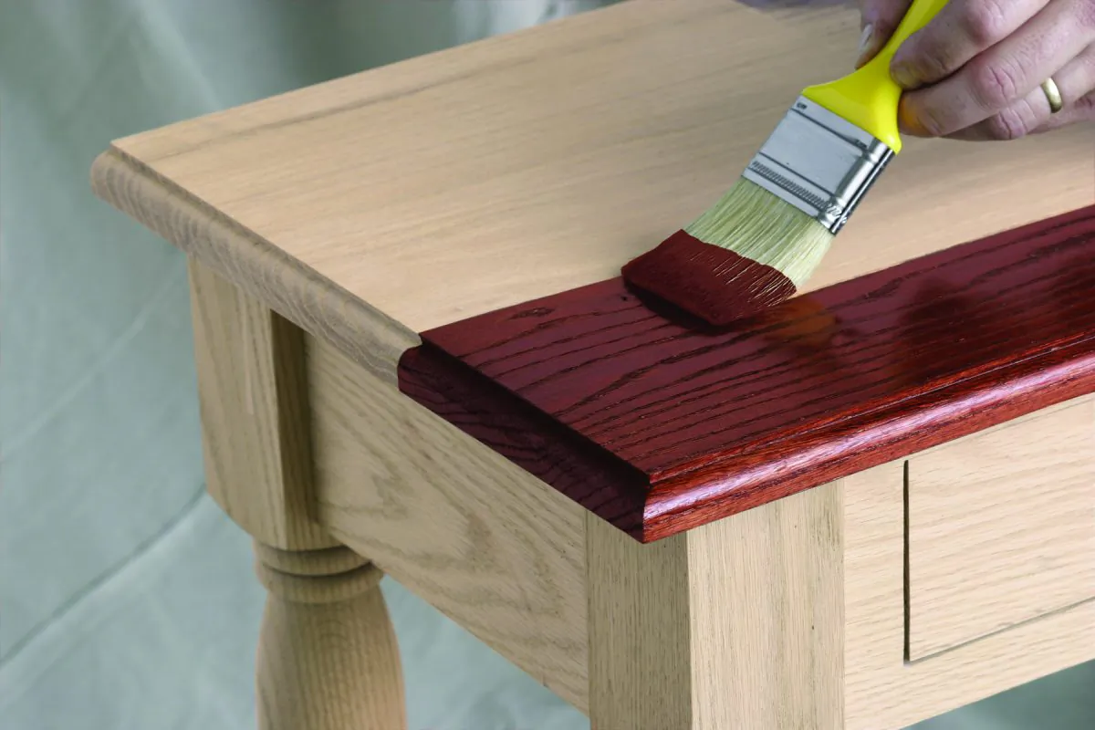 Applying a fresh finish to wood furniture, cabinets, and accessories is a simple DIY project that emphasizes the natural grain pattern on any wood. (News Canada)
