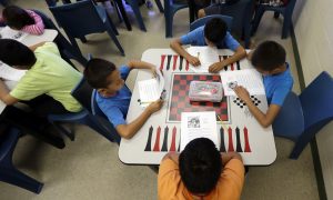 In Midst of Deportation Trials, Migrant Children Offered Schooling and Healthcare