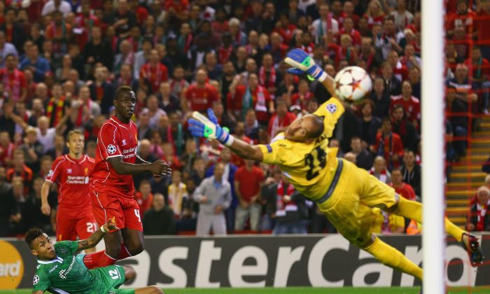 Mario Balotelli of Liverpool scores the opening goal past Milan Borjan of Ludogorets Razgrad in UEFA Champions League action at Anfield on Sept. 16, 2014 in Liverpool, England. (Clive Brunskill/Getty Images)