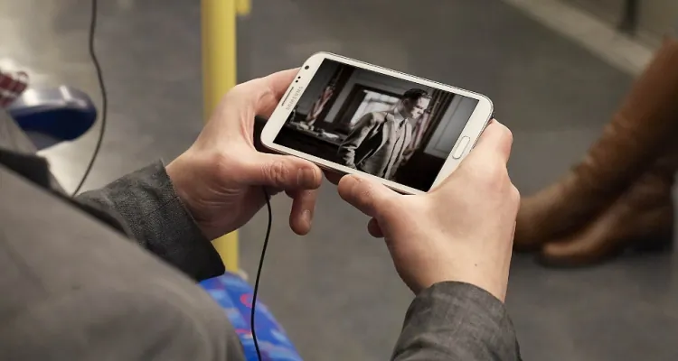 Watching TV on Smartphone (Courtesy of thetechgeek.com)