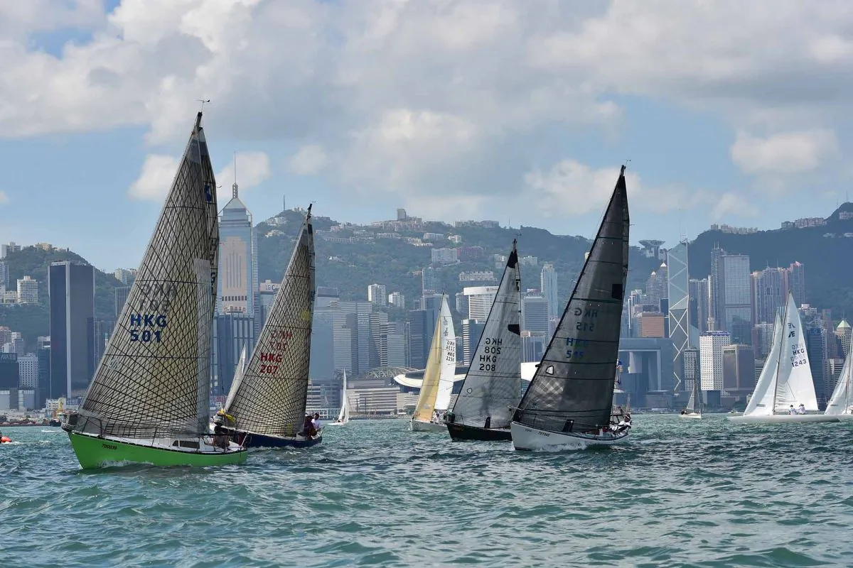 Ruffian Class Boats start at the Autumn Regatta in Victoria Harbour for Race-2 of the 3-Race event on Sunday Sept 14, 2014. The 2-boats on the left are ‘Helios’ and ‘Bandolero’ and on the right is ‘Diablo’ and winner of the Class ‘Victory 9'. (Bill Cox/Epoch Times)