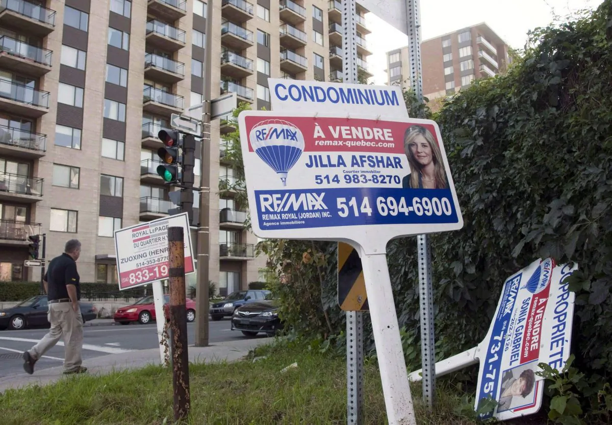 The Canadian Real Estate Association forecasts sales to increase for Canada as a whole in 2014. However, Quebec and the Maritime provinces are expected to see declines. (The Canadian Press/Ryan Remiorz)