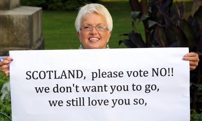 Belfast City councilor Ruth Patterson joins pro-Unionist supporters in Belfast, Northern Ireland, as part of a nationwide campaign in the U.K. on Sept. 17, 2014, ahead of the referendum on Scotland's independence. (Paul Faith/AFP/Getty Images)
