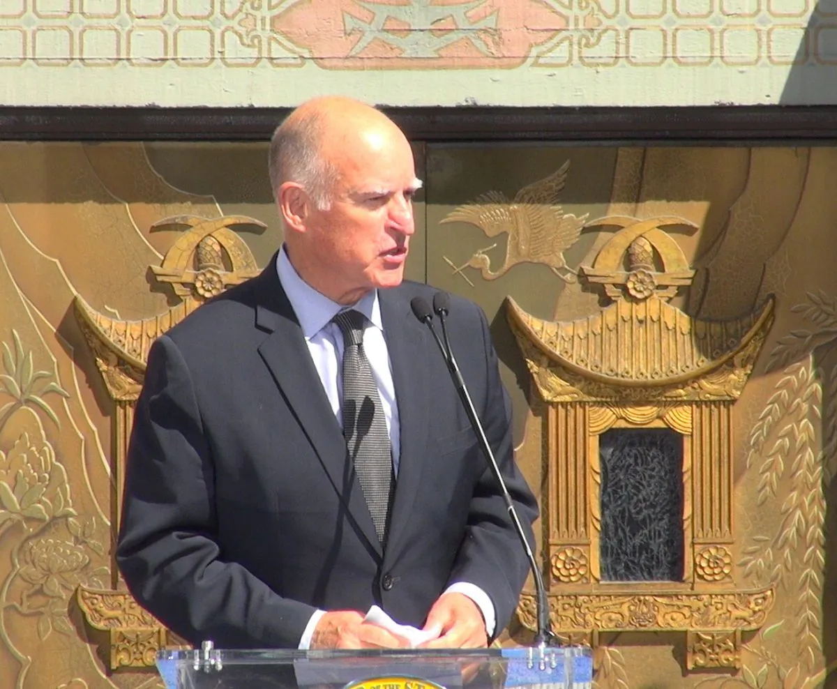California Governor Jerry Brown makes a speech at the signing ceremony for AB 1839 on Sept. 18 at the TLC Chinese Theatre in Hollywood, Calif. The measure will increase tax incentives for film and television production in the state. (Wen Xue/NTD News)