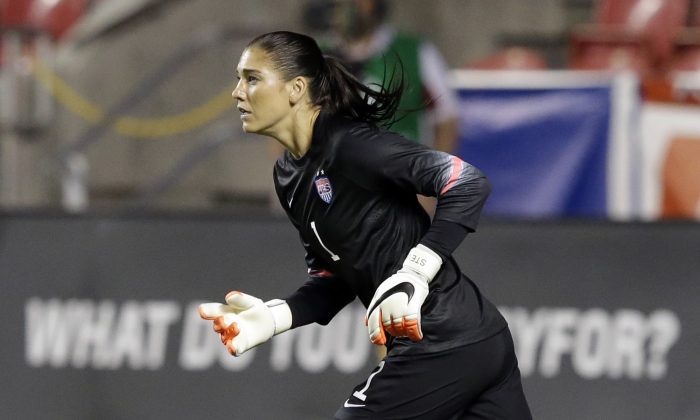 United States' goalkeeper Hope Solo (1) looks up field in second half of an international friendly game with Mexico on  Saturday, Sept. 13, 2014, in Sandy, Utah.  (AP Photo/Rick Bowmer)