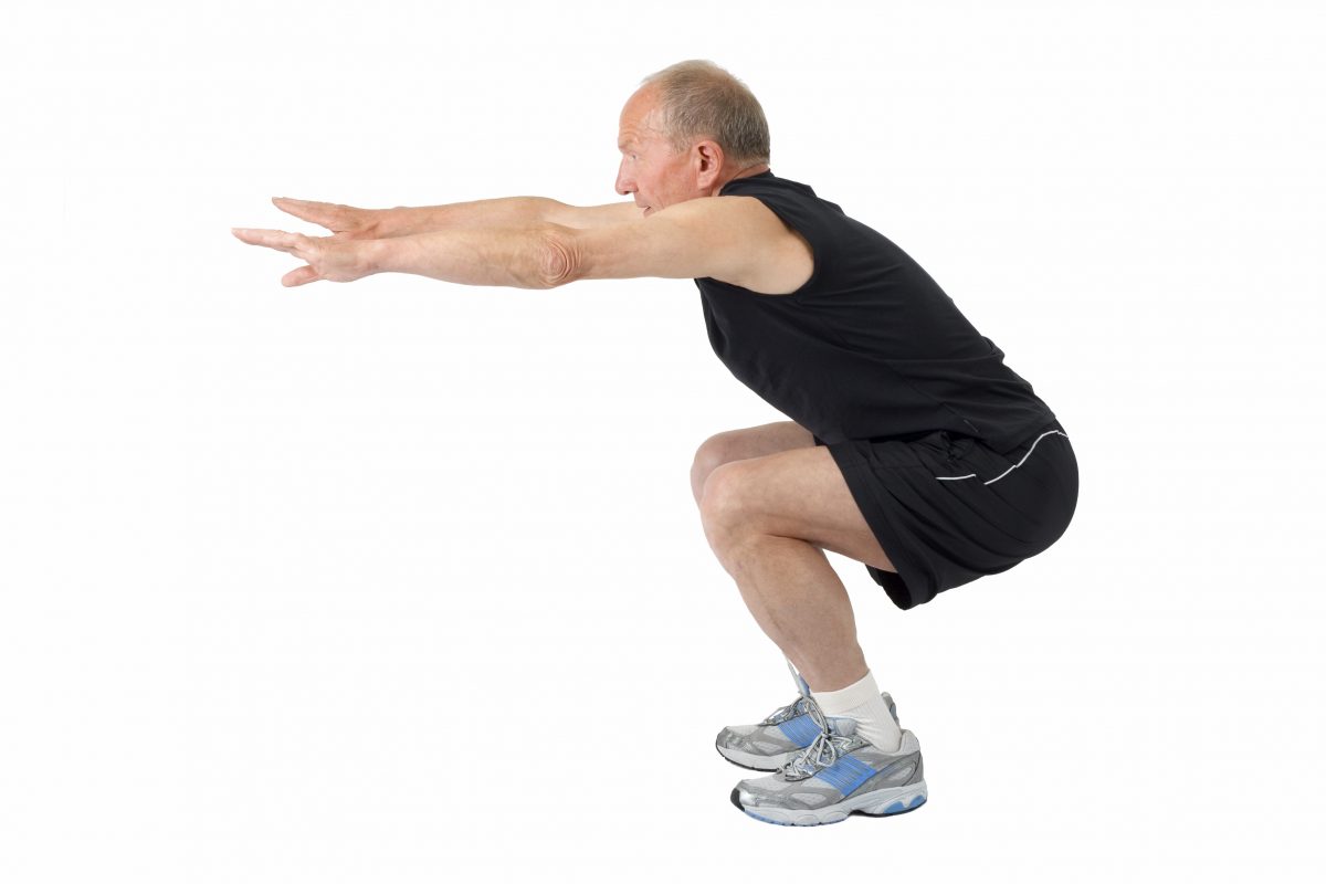 Standing exercises, such as squats, are an excellent way to engage multiple muscle groups throughout the body. (Arsty/iStock/Thinkstock)