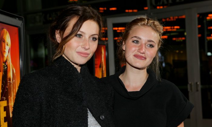 Actors and recording artists Aly Michalka (L) and AJ Michalka arrive at the premiere of Magnolia Pictures' "How I Live Now" at ArcLight Hollywood on November 5, 2013 in Hollywood, California.  (Photo by Mike Windle/Getty Images)