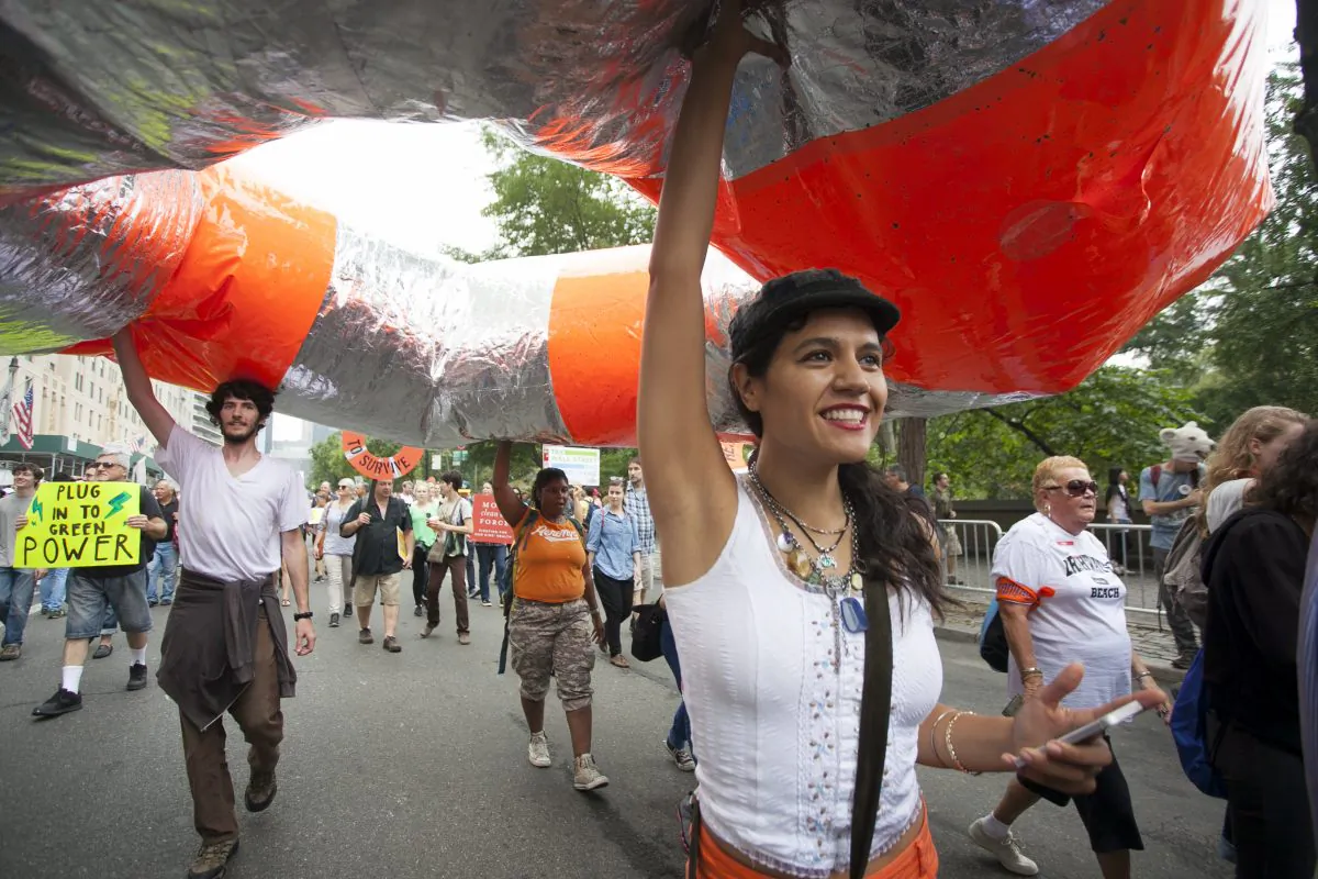 Around 310,000 attendees were at the People's Climate March in Manhattan, N.Y., on Sept. 21, 2014. (Samira Bouaou/Epoch Times)
