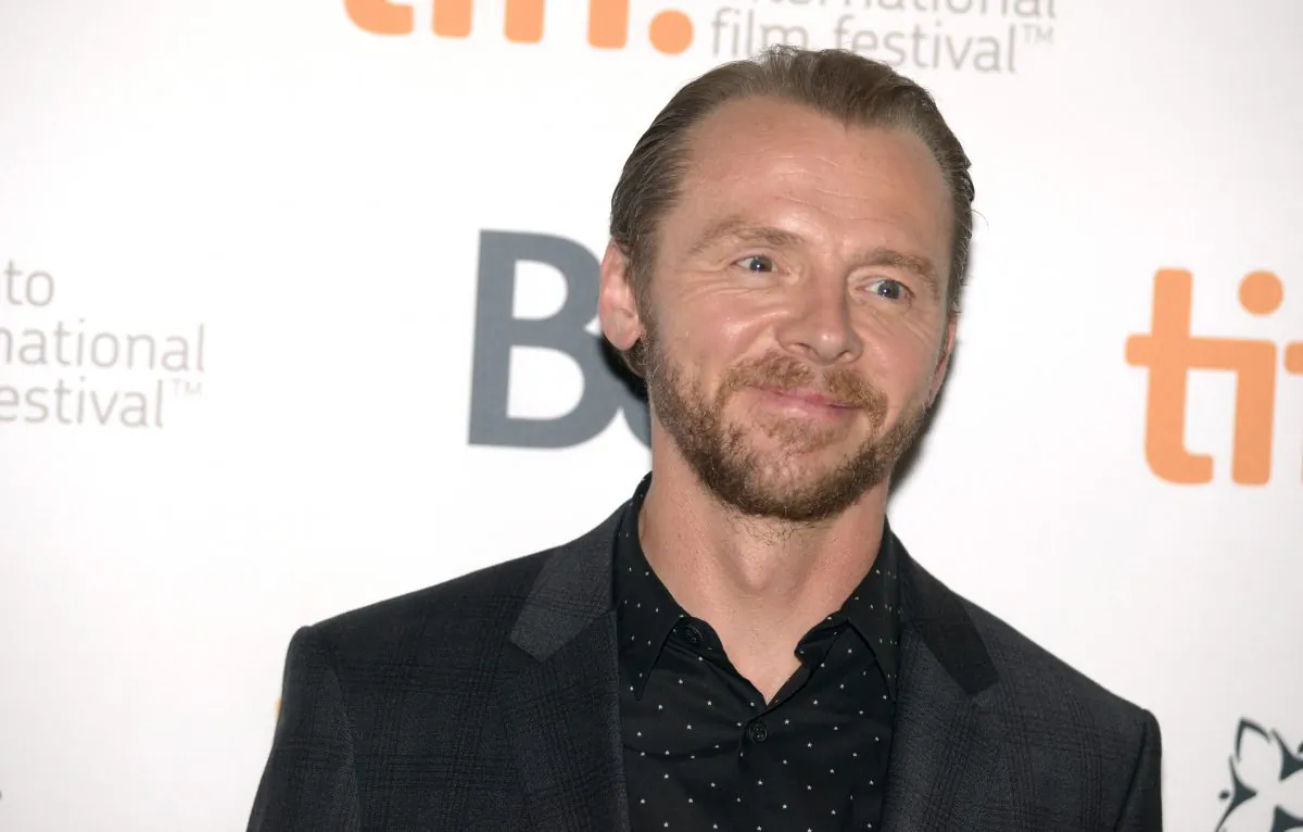 Simon Pegg arrives at the premiere of "Kill Me Three Timesl" on day 3 of the Toronto International Film Festival at the Scotiabank Cinema 2 on Saturday, Sept. 6, 2014, in Toronto. (Photo by Brian Bettencourt/Invision/AP)