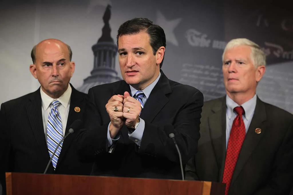 U.S. Sen. Ted Cruz (R-Texas) (C) speaks as Rep. Mo Brooks (R-Ala.) (R) and Rep. Louie Gohmert (R-Texas) (L) listen during a news conference on Capitol Hill in Washington, D.C., on Sept. 9, 2014 (Alex Wong/Getty Images)