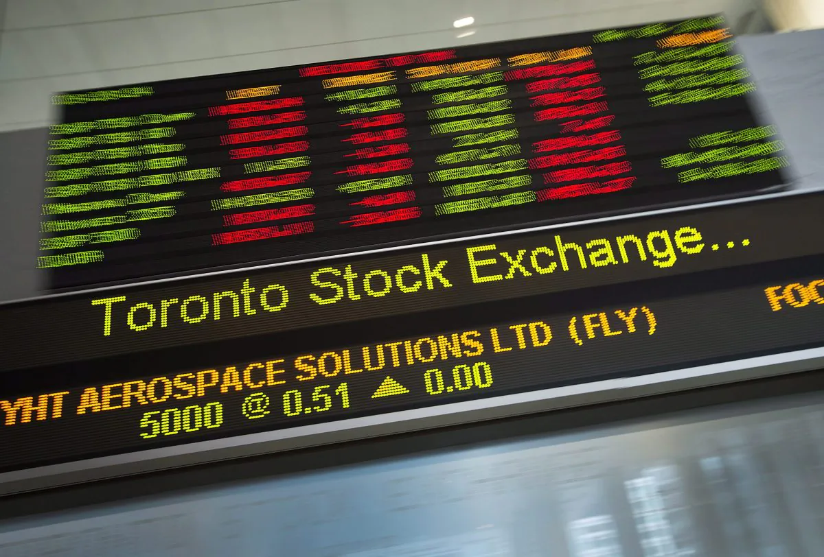Financial numbers flow on the digital ticker tape at the TMX Group in Toronto's financial district. (The Canadian Press/Darren Calabrese)