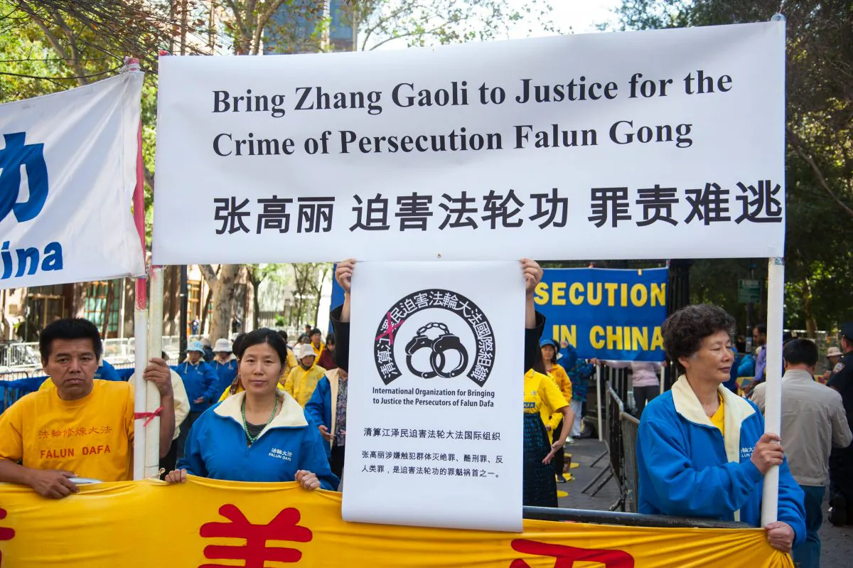 Falun Gong practitioners stage a peaceful protest against China's Vice Premier Zhang Gaoli, who is believed to be guilty of genocide, torture, and other crimes against humanity, during the Climate Summit at the U.N., in New York City, on Sept. 23, 2014. (Dai Bing/Epoch Times)