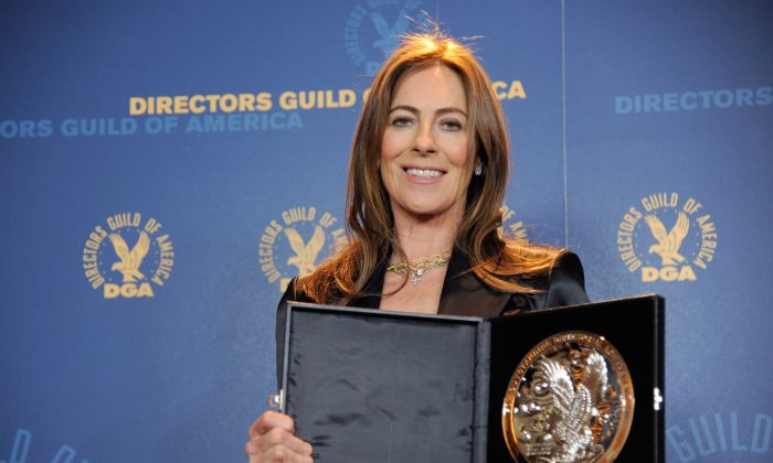Kathryn Bigelow poses backstage with her feature film nomination plaque for "Zero Dark Thirty" at the 65th Annual Directors Guild of America Awards at the Ray Dolby Ballroom on Saturday, Feb. 2, 2013, in Los Angeles. (Photo by Chris Pizzello/Invision/AP)