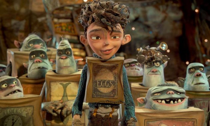 Eggs (voiced by Isaac Hempstead Wright) is surrounded by his Boxtroll friends in “The Boxtrolls.” (Laika, Inc./Focus Features) 
