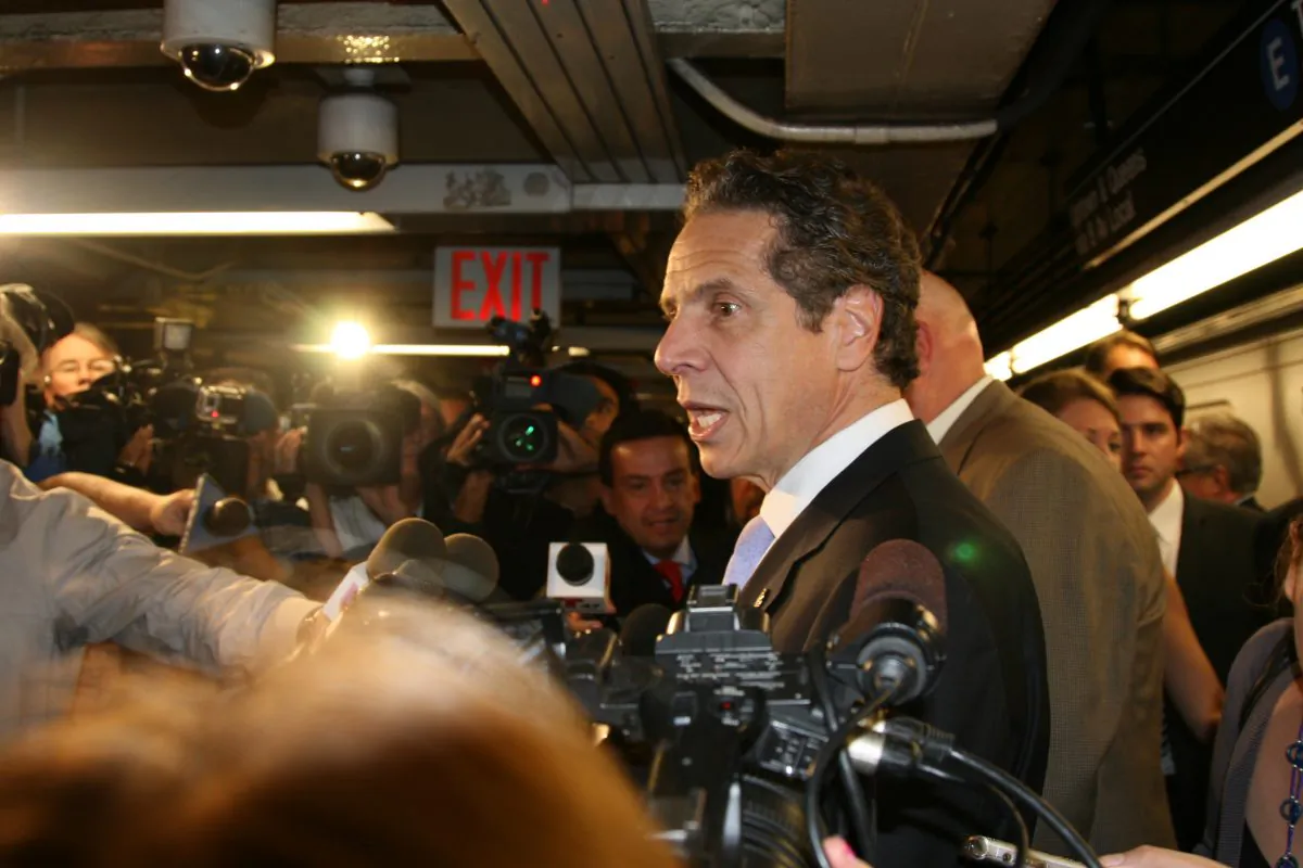 New York Governor Andrew Cuomo speaks outside the E train on Sept. 25, 2014. (Shannon Liao/Epoch Times)