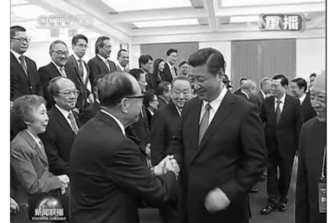 On Sept. 22, Xi Jinping met with a delegation of businessmen from Hong Kong. The occasion was used by Xi to strike a less aggressive tone on the Hong Kong issue than other officials in Beijing have. (Screenshot via CCTV)