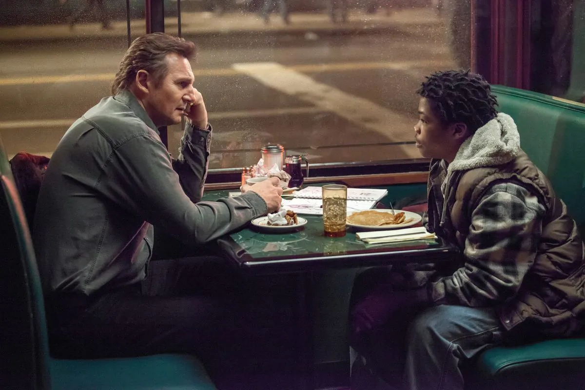 Liam Neeson and Brian “Astro” Bradley in "A Walk Among the Tombstones." (Atsushi Nishijima/Universal Pictures)