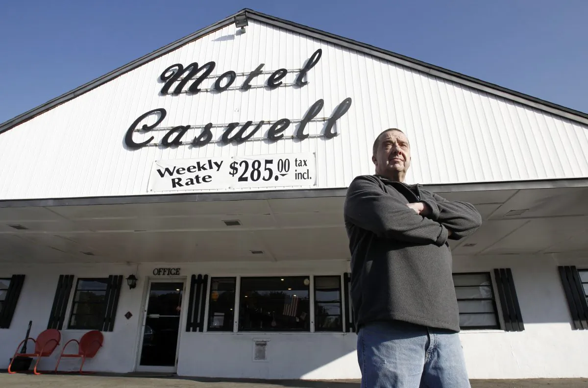 Owner Russ Caswell outside his Motel Caswell in Tewksbury, Mass. on Nov. 9, 2011. Caswell fought to keep the federal government from taking his motel because the government claimed there was drug-dealing among the motel's guests. A Federal judge dismissed the case in January of 2013. (Winslow Townson/AP Photo)