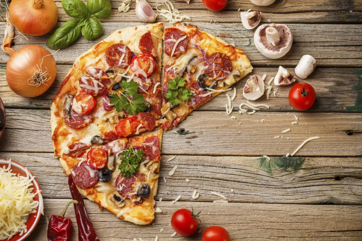 A homemade pizza with all the trimmings such as this one takes time to make, but a basic personal tortilla pizza only takes 10 minutes. (grafvision/iStock/Thinkstock)