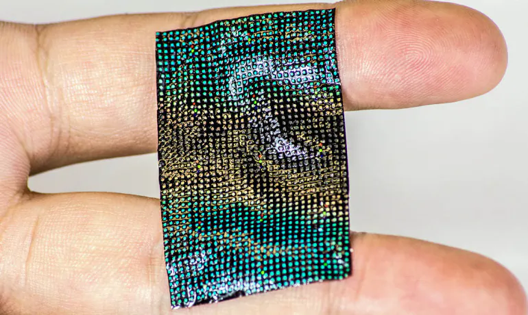"One can imagine cosmetics companies being interested in the ability to measure skin's dryness in a portable and non-intrusive way," Yonggang Huang says. "This is the first device of its kind." (Credit: John A. Rogers/University of Illinois)
