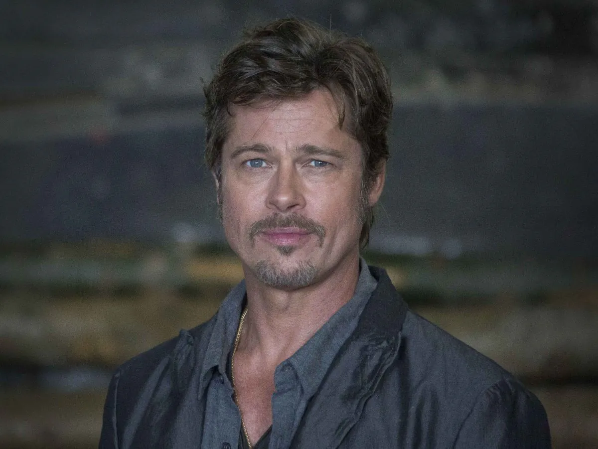 U.S actor Brad Pitt poses, during a photo call for the film, Fury, at the Tank museum, in Bovington, Dorset, southern England, Thursday, Aug. 28, 2014. Pitt married actress Angelina Jolie on Saturday in Chateau Miraval, France, says a spokesman for the couple. (Photo by Joel Ryan/Invision/AP)