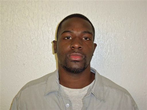 This March 21, 2011 photo provided by the Oklahoma Department of Corrections shows Alton Nolen, of Moore, Okla. Prison records indicate that Nolen, the suspect in the beheading of a co-worker at an Oklahoma food processing plant Thursday, Sept. 25, 2014, had spent time in prison and was on probation for assaulting a police officer. (AP Photo/Oklahoma Department of Corrections)