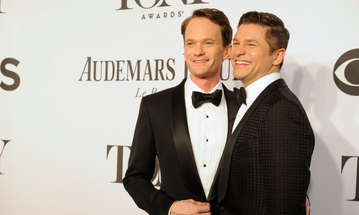 In this June 8, 2014 file photo, Neil Patrick Harris, left, and David Burtka arrive at the 68th annual Tony Awards at Radio City Music Hall in New York. The How I Met Your Mother star and his actor-chef groom were married Sept. 6, in Italy. Theyd been dating for 10 years and are parents to 3-year-old twins, Gideon and Harper.  (Photo by Charles Sykes/Invision/AP, File)