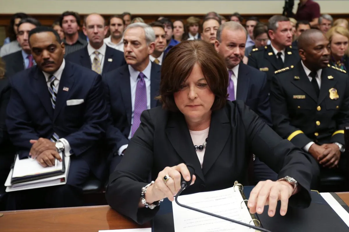 Secret Service Director Julia Pierson prepares to testify to the House Oversight and Government Reform Committee on Tuesday. (Chip Somodevilla/Getty Images)