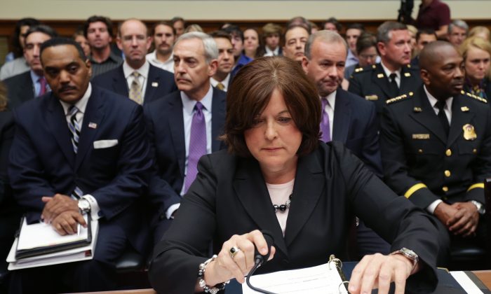 Secret Service Director Julia Pierson prepares to testify to the House Oversight and Government Reform Committee on Tuesday. (Chip Somodevilla/Getty Images)