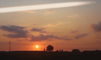 UFO Appears During Sunset Time Lapse Video (Video)