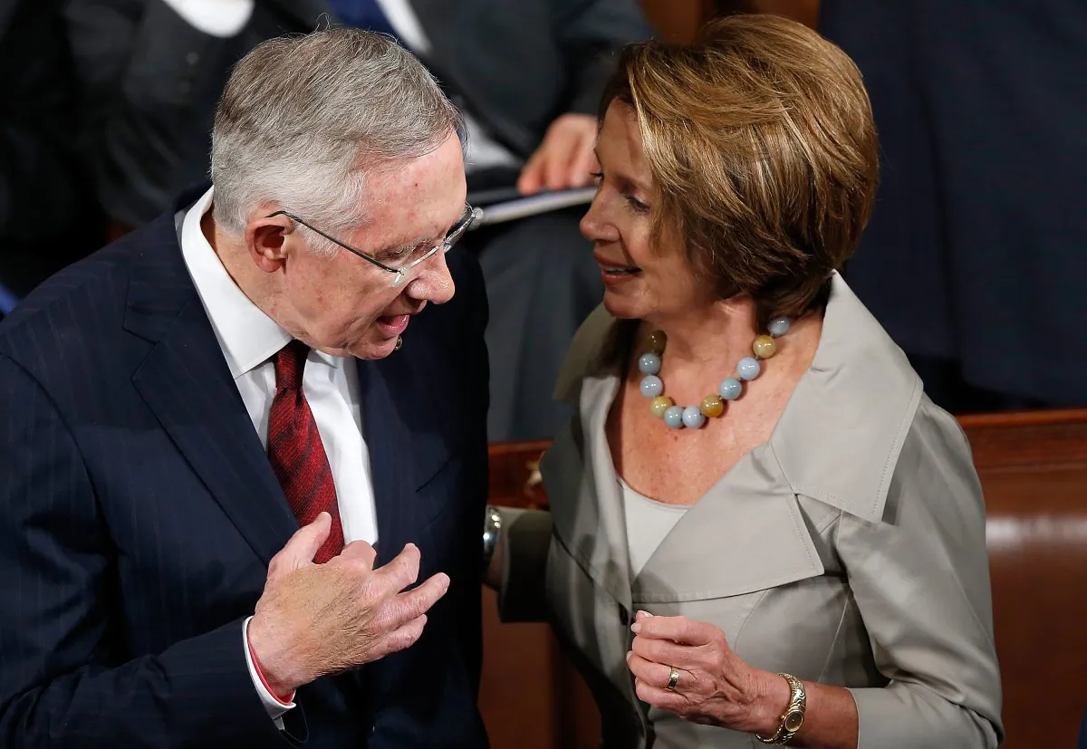 Senate Majority Leader Harry Reid (L) (D-Nev.) speaks with House Minority leader Nancy Pelosi (R) (D-Calif.) at the U.S. Capitol in Washington, D.C., on Sept. 18, 2014. (Win McNamee/Getty Images)