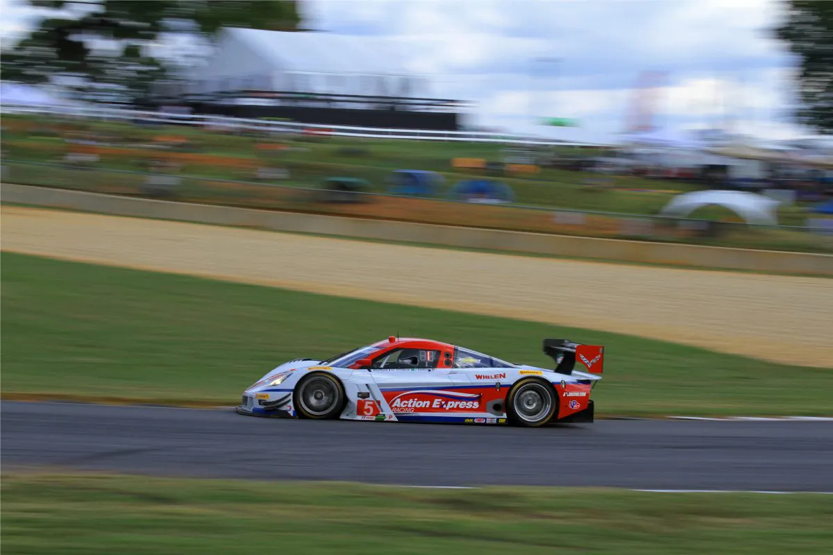 The #5 AXR Coyote-Corvette streaks from Turn 10a to 10b during Thusday afternoon prctice for the 17th Petit Le Mans at Road Atlanta. (Chris Jasurek/Epoch Times)