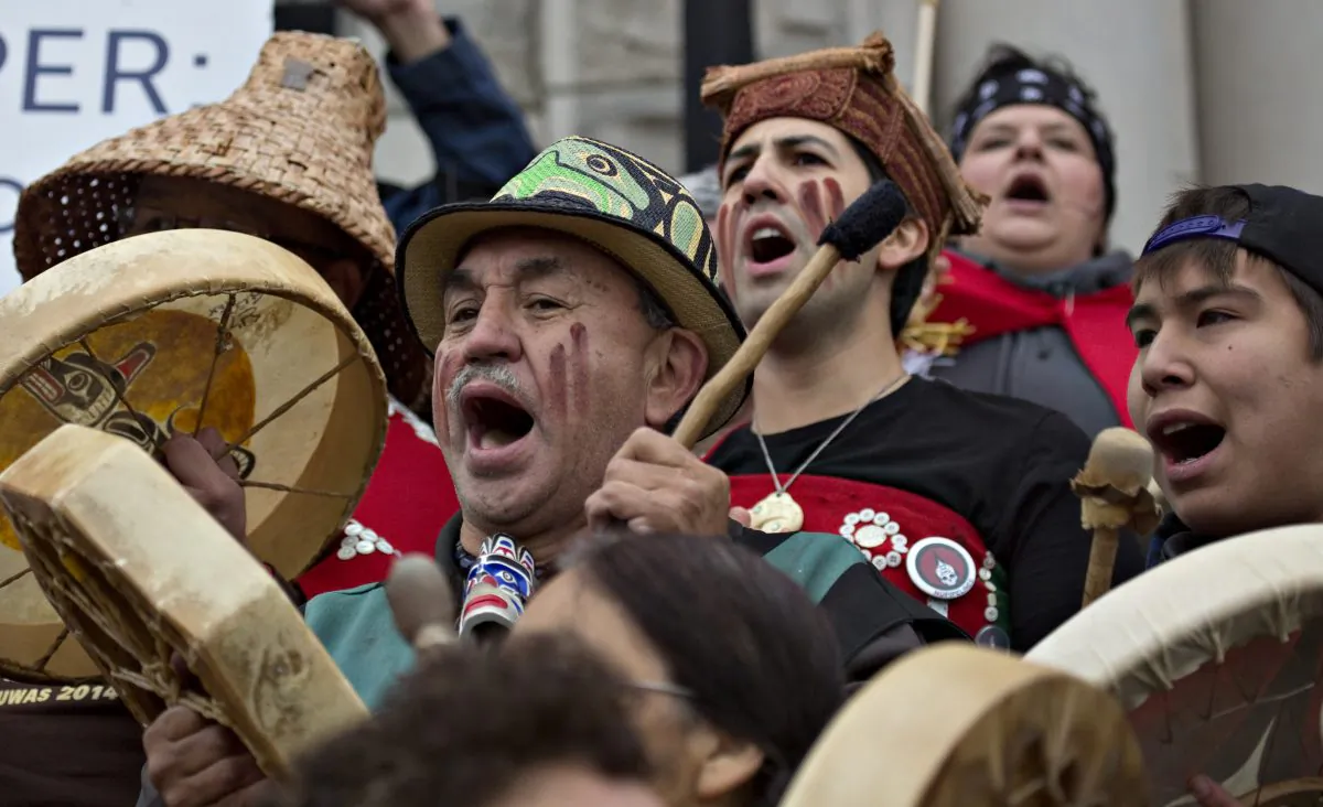 First Nation protesters gather on the front steps of the British Columbia Legislature during a demonstration against the Northern Gateway Pipeline project in Victoria, British Columbia Oct. 22, 2012. The protest was against the building of the oil pipeline from Albert across British Columbia to the northern coast. (REUTERS/Andy Clark)