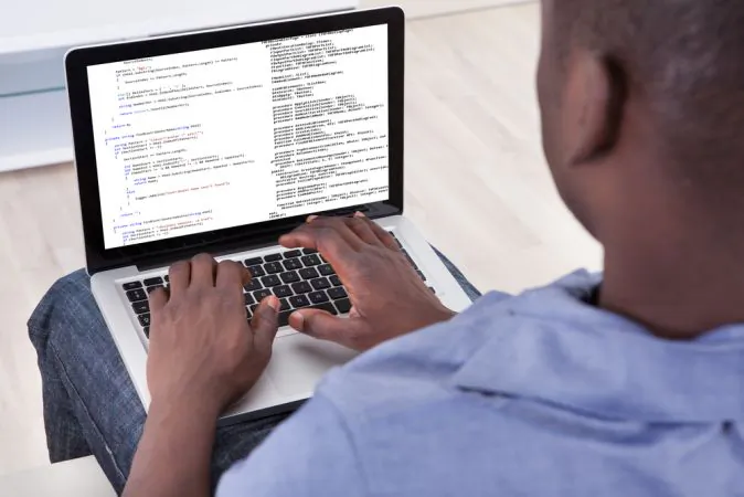 A software developer at work (Shutterstock*)