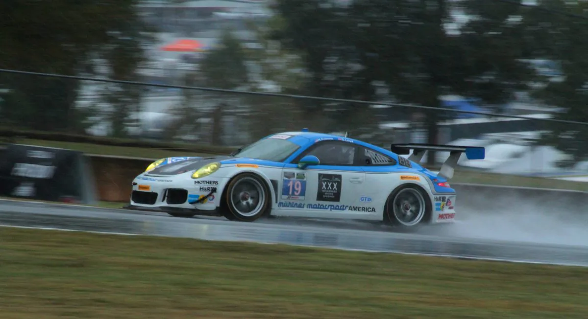 The #19 Muehlner Porsche completed seven sodden laps before parking. The Tudor United Sports car Championship Petit Le Mans fourth practice session was red-flagged immediately after. (Chris Jasurek/Epoch Times)