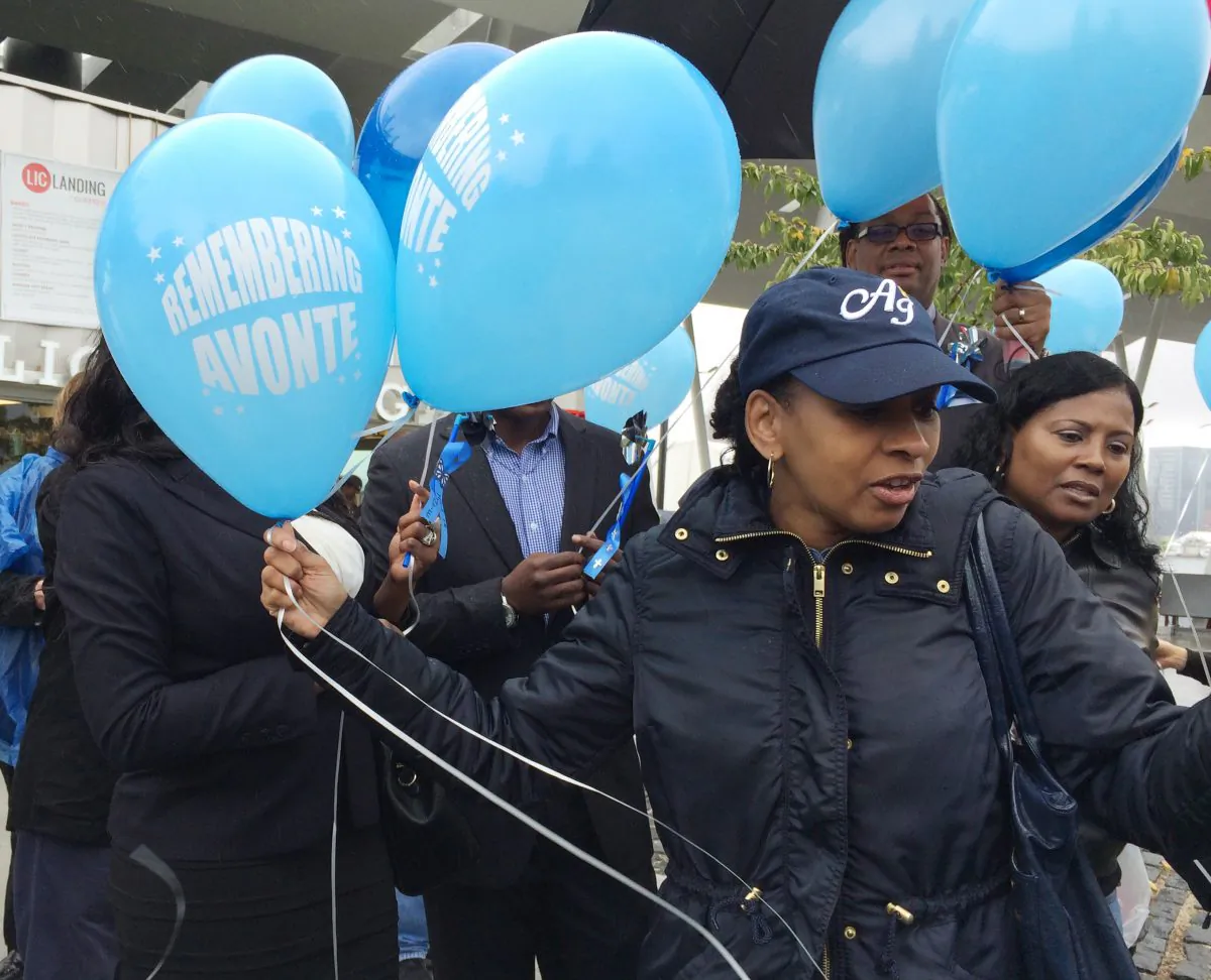 Vanessa Fontaine releases balloons in memory of her late son, Avonte Oquendo, at an event in New York marking the one year anniversary of Avonte’s disappearance, Saturday, Oct. 4, 2014. The 14-year-old autistic boy wandered out of his school on Oct. 4, 2013 and was later found dead in an apparent accidental drowning. (AP Photo/Colleen Long)
