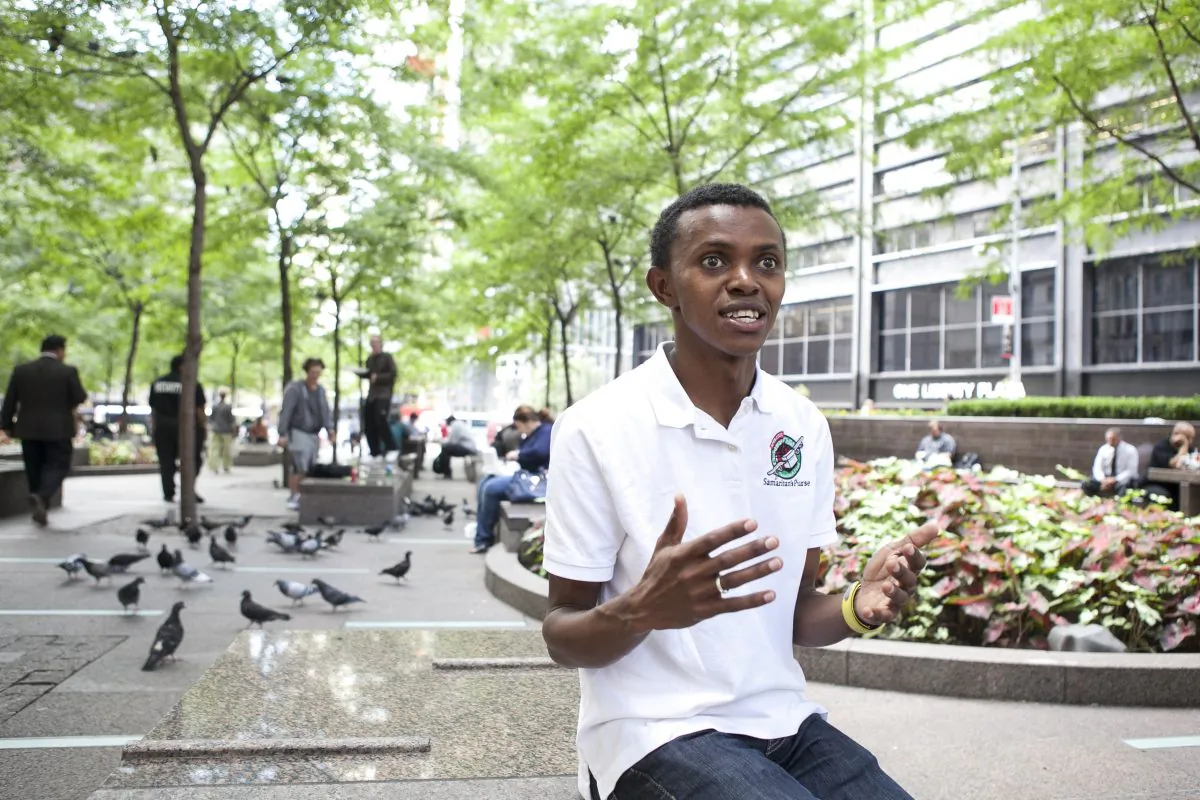 Alex Nsengimana, a Rwandan genocide survivor at Zuccotti Park in Lower Manhattan, New York on Sept. 18, 2014. (Samira Bouaou/Epoch Times)