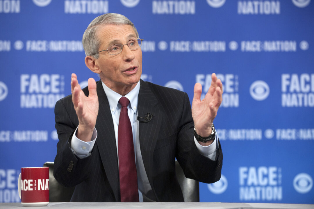 The National Institute of Health's Dr. Anthony Fauci, the nation's top infectious disease expert, speaks on CBS's "Face the Nation" in Washington. Speaking on the Ebola virus, Fauci said it's perfectly normal to feel anxious about a disease that kills so fast and is ravaging parts of West Africa, but predicts there won't be an outbreak in the US. (AP Photo/CBS News, Chris Usher)