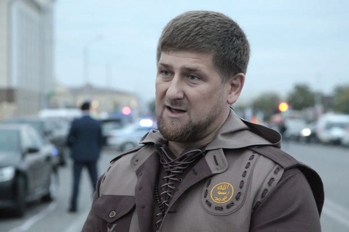 Chechen regional leader Ramzan Kadyrov talks with press in the Chechen regional capital, Grozny, Russia, Sunday, Oct. 5, 2014. A suicide bomber blew himself up Sunday in the capital of Chechnya, killing five policemen and wounding 12 others as the city celebrated the birthday of Ramzan Kadyrov. (AP Photo/Musa Sadulayev)