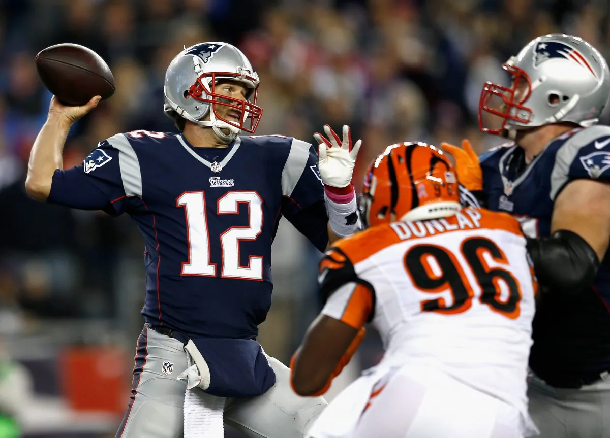 Tom Brady of the New England Patriots throws a pass against the Cincinnati Bengals at Gillette Stadium on Oct. 5, 2014 in Foxboro, Mass. (Jim Rogash/Getty Images)