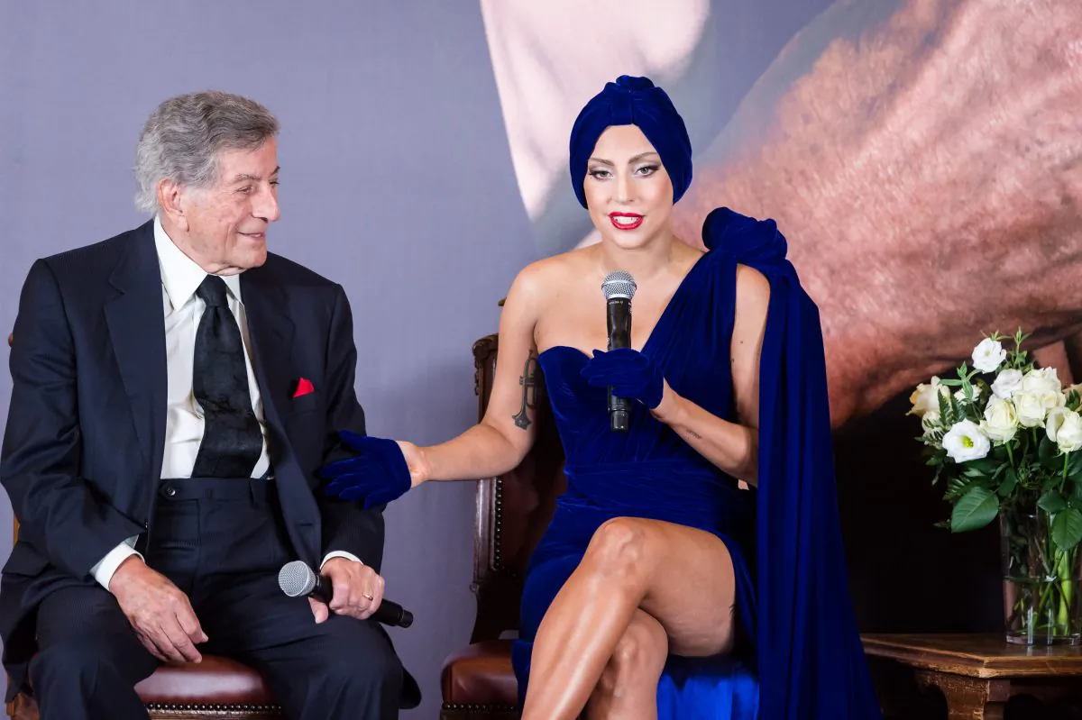 Lady Gaga, right, and Tony Bennett talk during a media event at the Brussels' city hall on Monday Sept. 22 , 2014. (AP Photo/Geert Vanden Wijngaert)