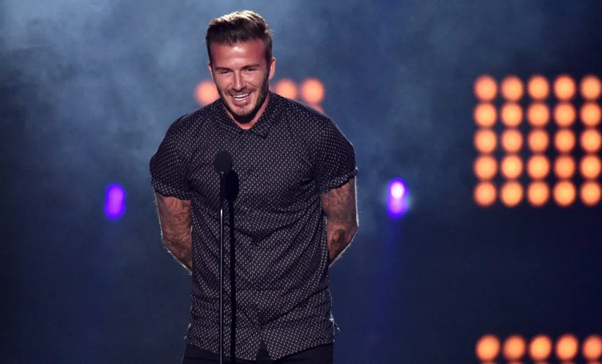 David Beckham accepts the legend award at the Kids' Choice Sports Awards at UCLA's Pauley Pavilion on Thursday, July 17, 2014, in Los Angeles. (Photo by John Shearer/Invision/AP)