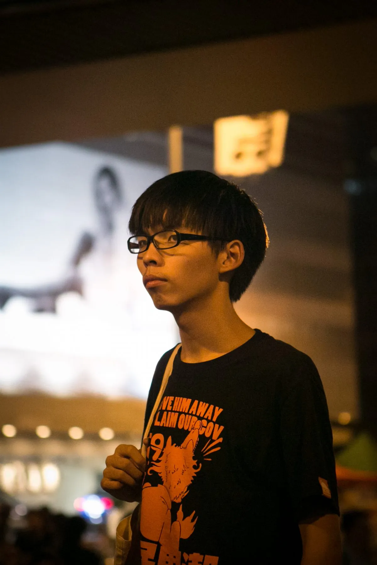 Joshua Wong, one of the organizers of "Occupy Hong Kong," finishes speaking with the media in the Central District of Hong Kong on Oct. 6, 2014. (Benjamin Chasteen/Epoch Times)