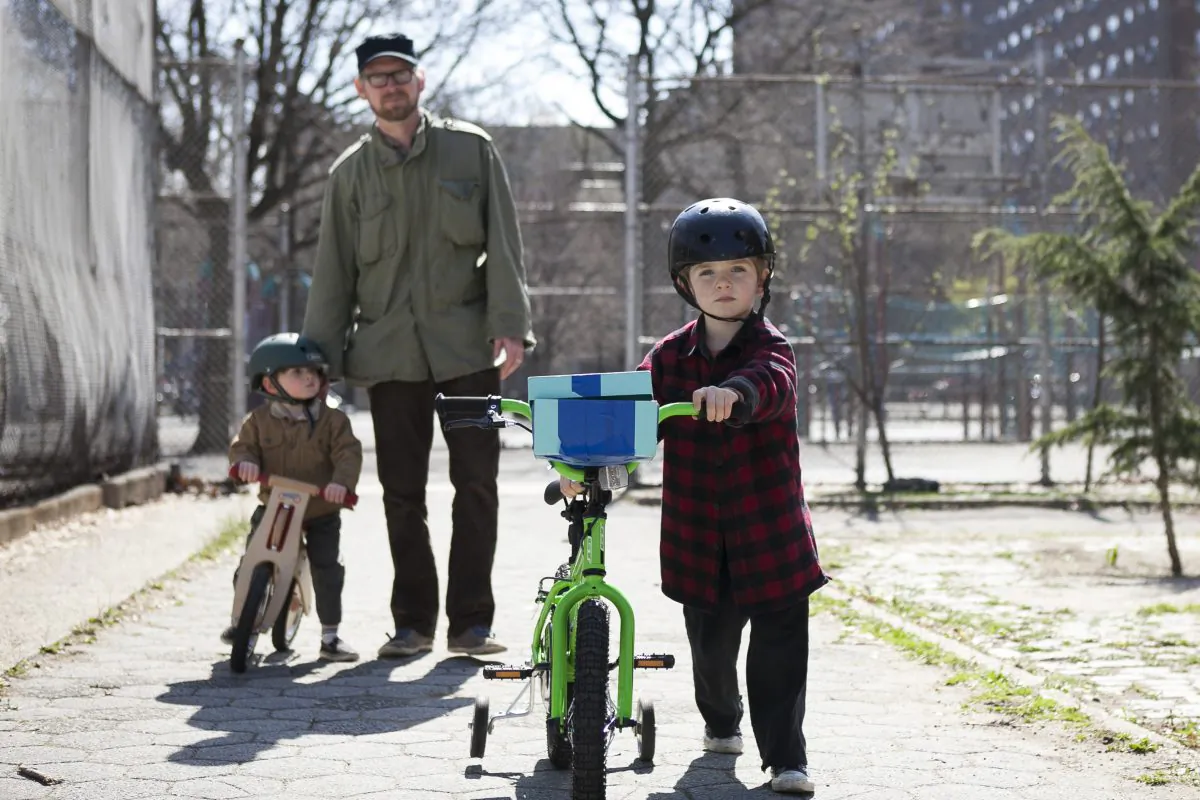 Brian Crowley takes his children Harrison,4, and Ansel, 2, to the Luther Gulick Park on the Lower East Side in Manhattan, April 17. (Samira Bouaou/Epoch Times)