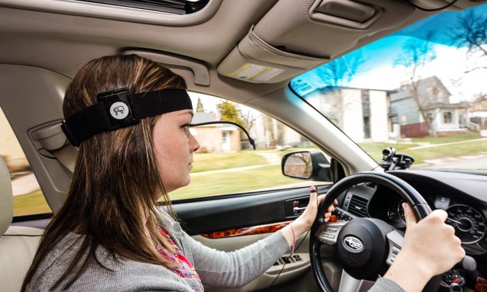 A driver undergoes  Cognitive Distraction testing in Salt Lake City. Two new studies have found that voice-activated smartphones and dashboard infotainment systems may be making the distracted-driving problem worse. (AP Photo)