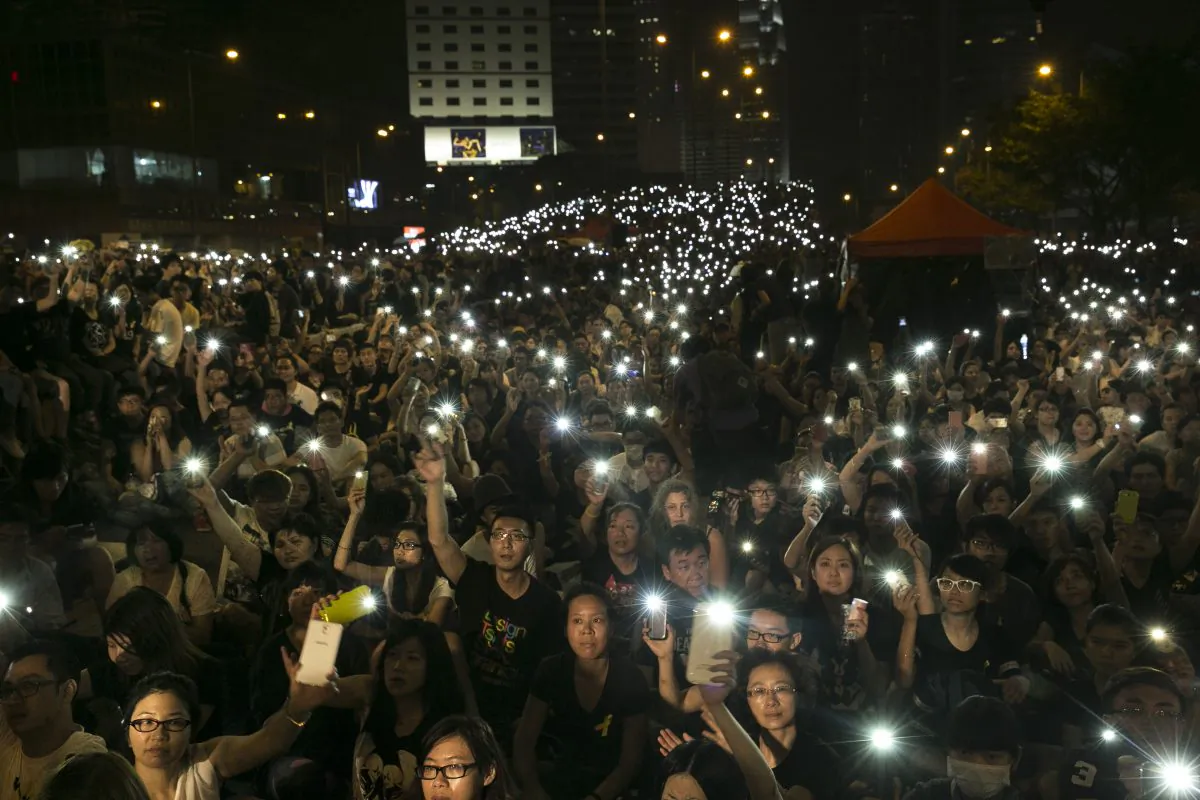 Tens of thousands of democracy protesters hold lights during speeches Oct. 4, 2014 in Hong Kong. On Oct. 10 negotations between students protesting for universal suffrage and the Hong Kong government are scheduled to begin. (Paula Bronstein/Getty Images)