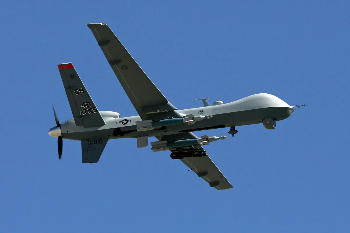 An MQ-9 Reaper drone flies by Aug. 8, 2007, at Creech Air Force Base in Indian Springs, Nevada. (Ethan Miller/Getty Images)